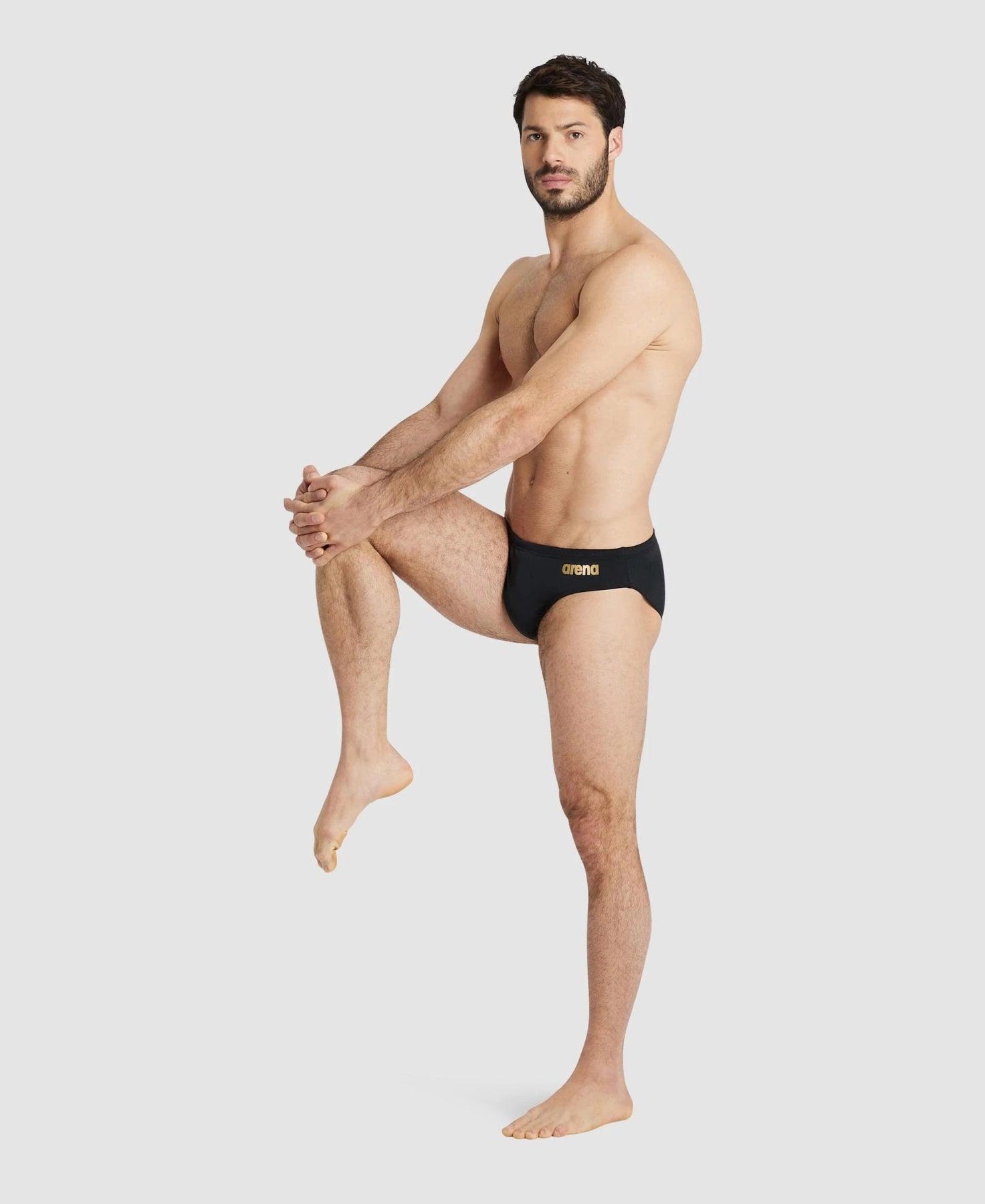 Team Swim Briefs Solid miesten uimahousut, musta - kultaArena